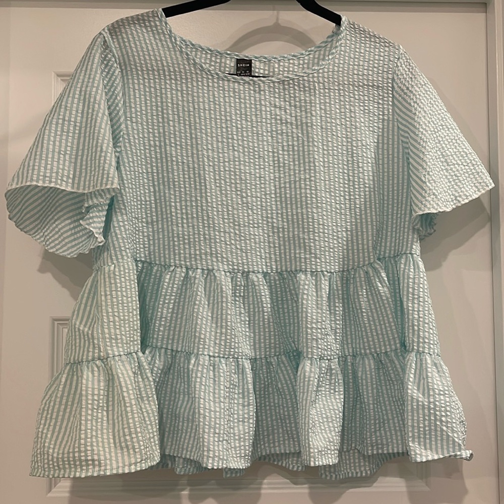 Blue and white seersucker striped peplum ruffle babydoll top
